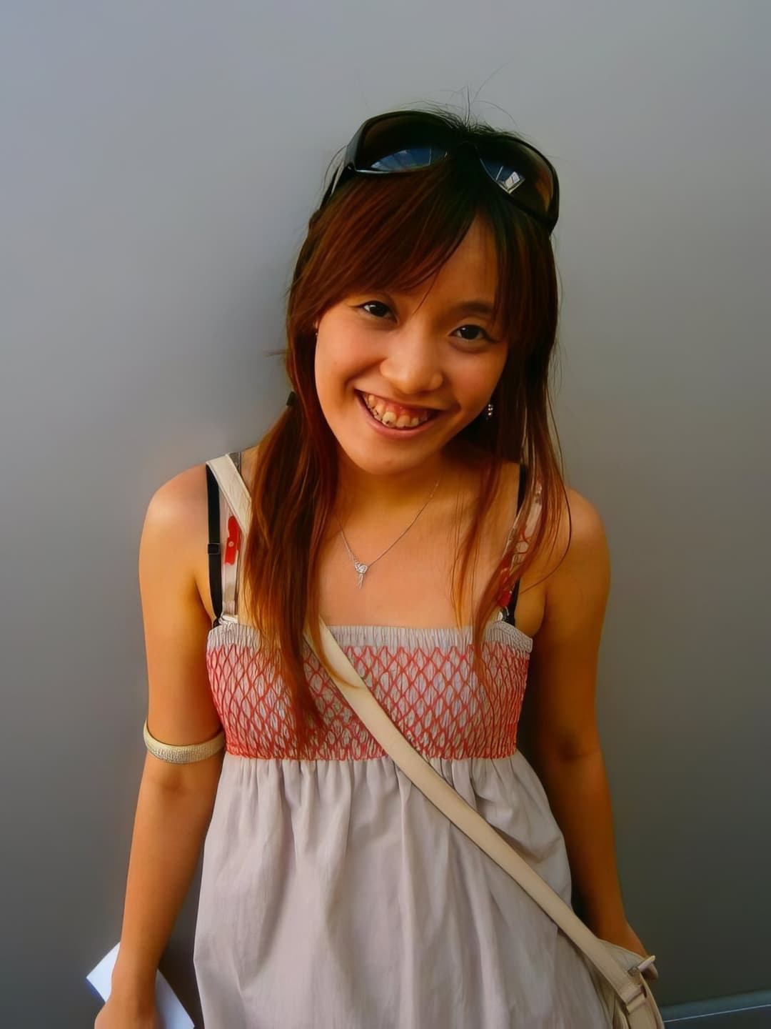 Cute HongKong slut revealing her boobs