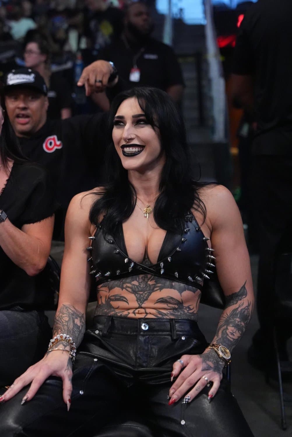 Mami Rhea teasing in front of crowd (AI)