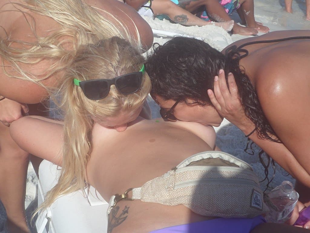 Beach sluts lick each other