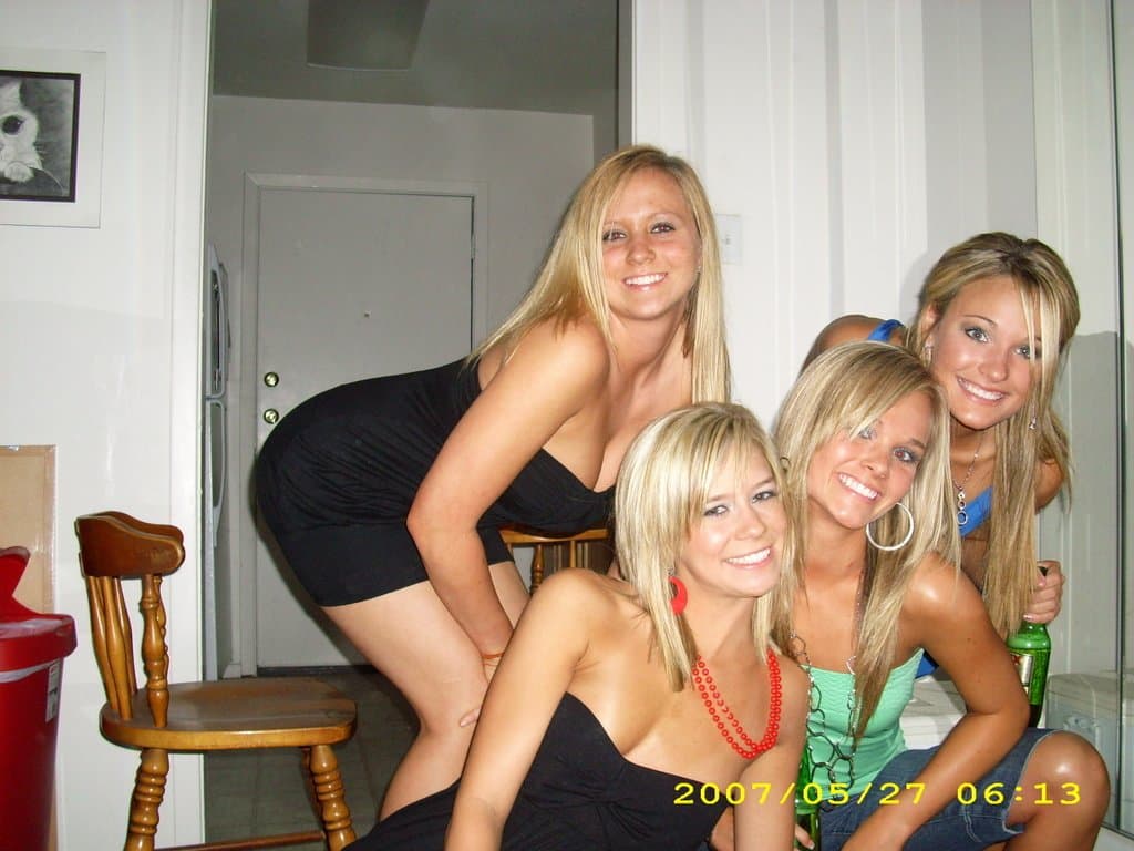 Sorority girls pre-game drink in the dorm room