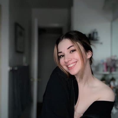 Click to view full size Hottest Milf ever? This curvy slut who loves sticking her tongue out comes damn close