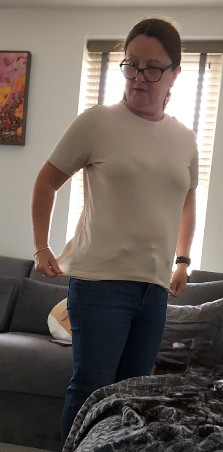 Pick an outfit to see this shy mature milf flashing her little tits. I will add it to the gallery.
