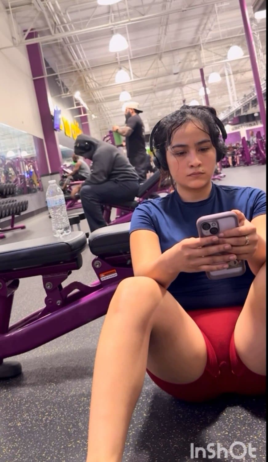 Creepshot Latina red gym shorts