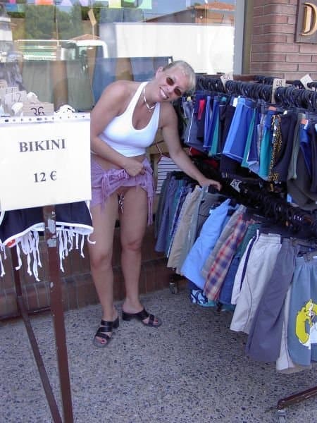 Amateur flasher with cunt piercings