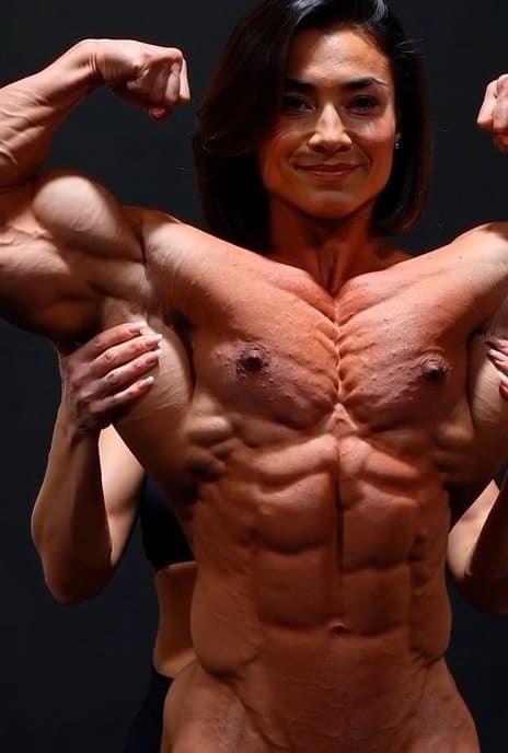 Click to view full size And a naked bodybuilder really loves her roided muscles to be worshipped by girls