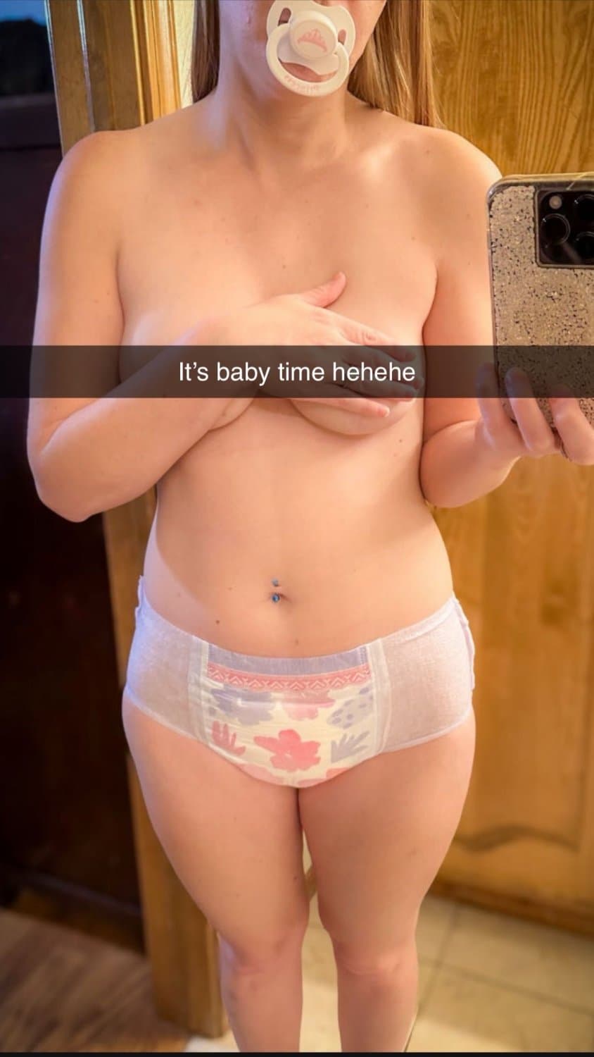 Hot blonde teen in diapers