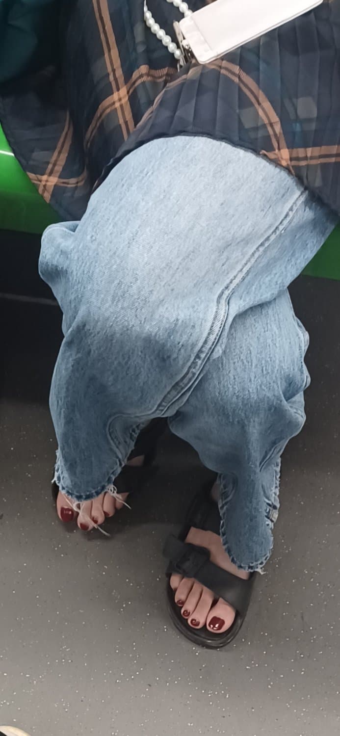 Beautiful sexy feet with red nails