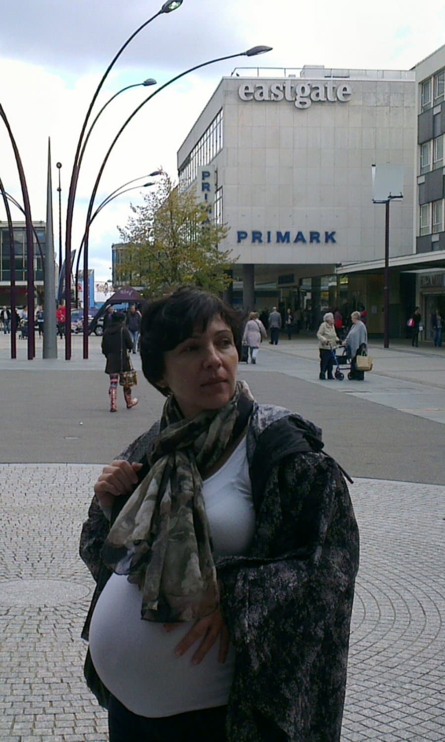 Repost 10 times and I will drop her top to reveal pregnant breasts and belly.