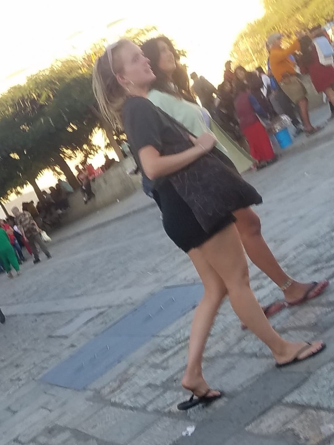 2 friends, blonde and brunette, in shorts, nice legs