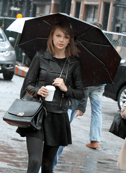 Taylor Swift tight black leather jacket outfit