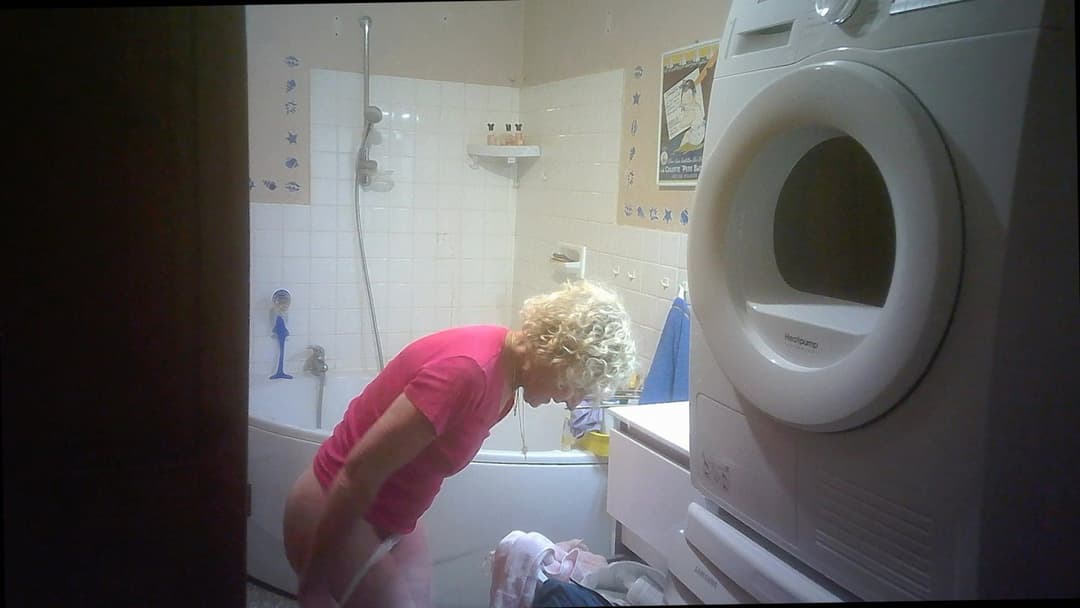 Two hidden cams for nurse Solange braless