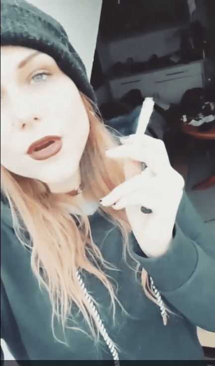 smoking hot emo hipster goth girl fucks the guys in the band. I love when women smile and smoke.