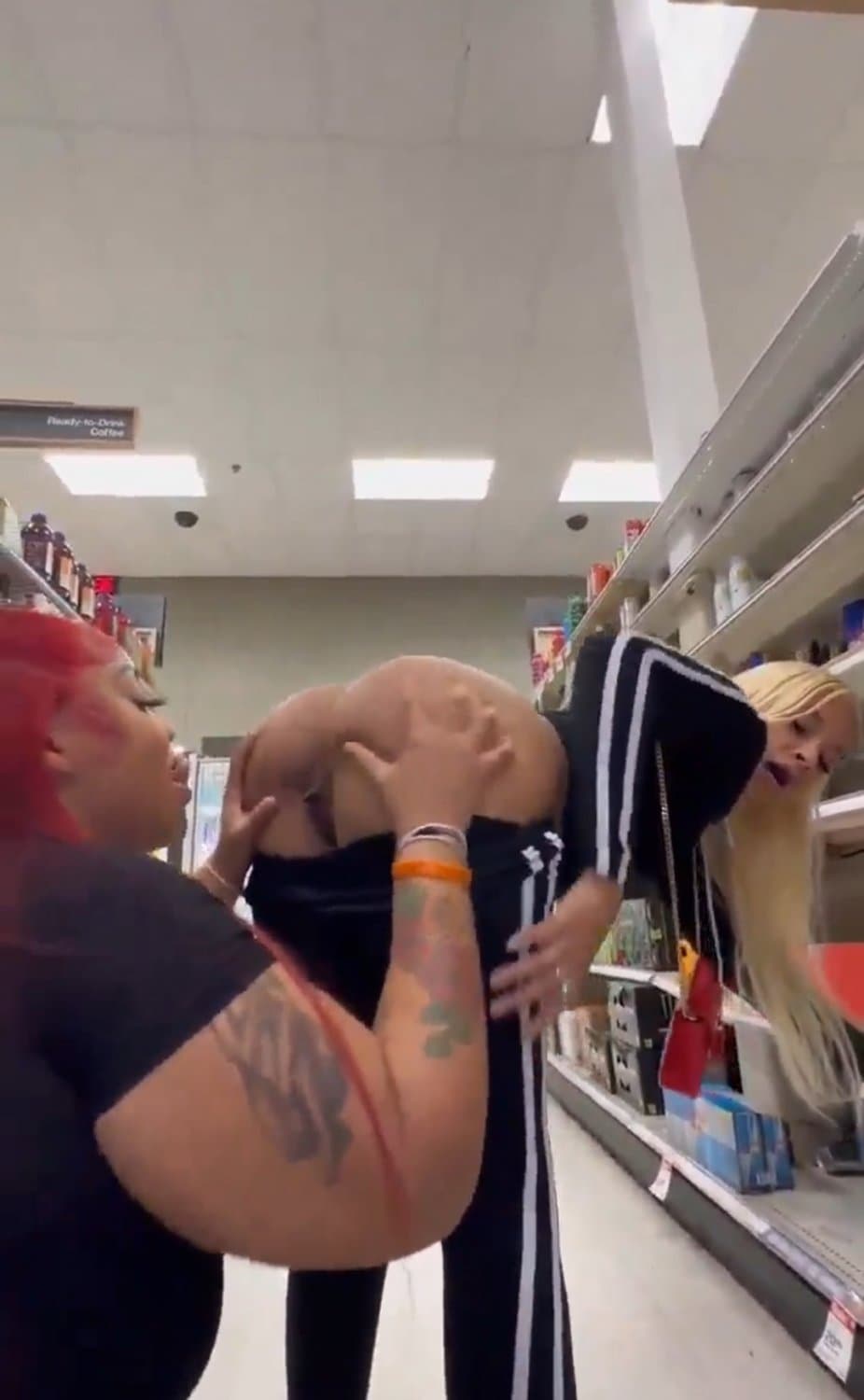 licking ass and vagina in the supermarket