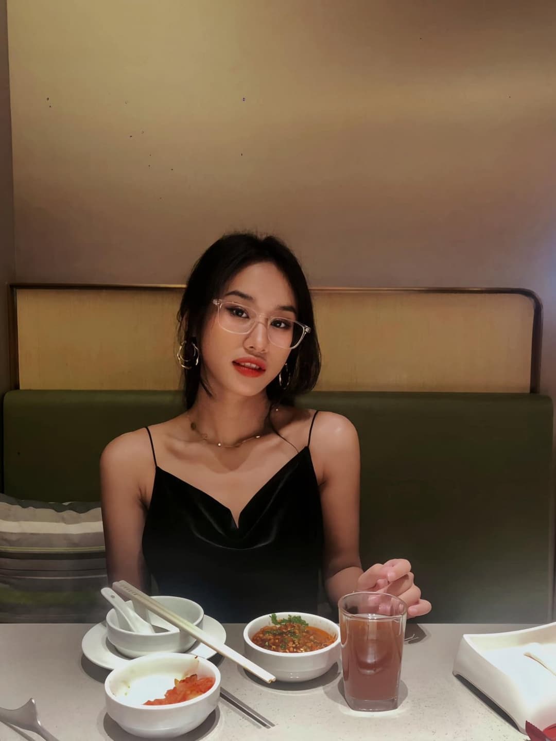 Asian secretary working overtime with her boss at night