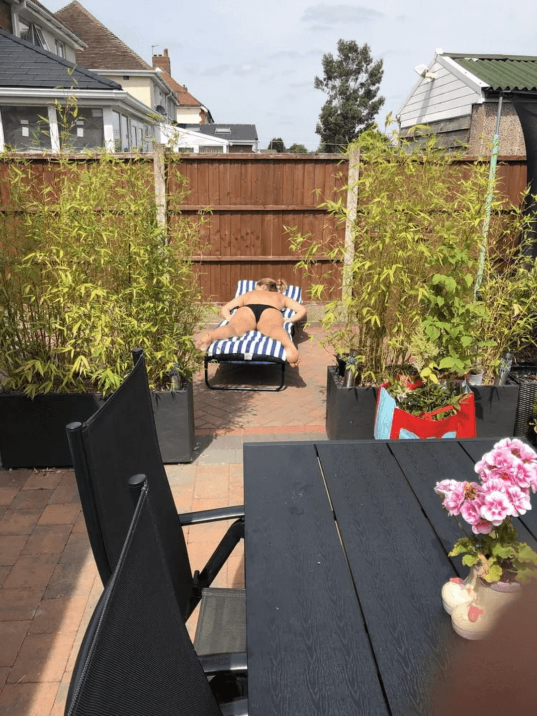 Uk blonde milf sunbathing in her big black underwear panties