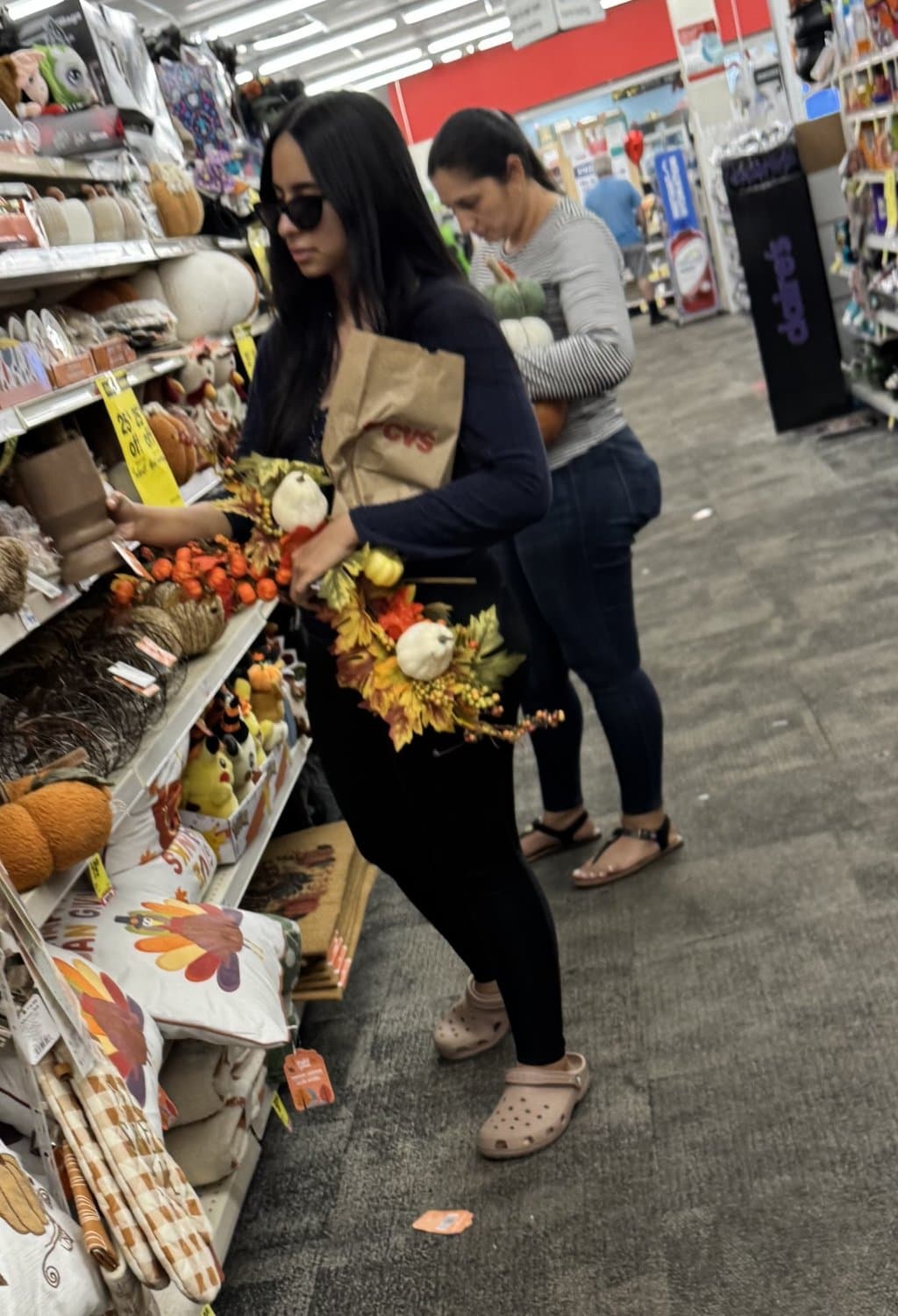 Mother in blue jeans  & Daughter in black tights.