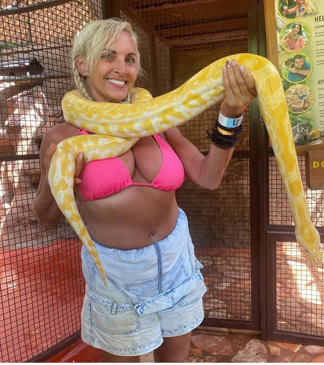 My mom and I on vacation she needs a big black snake to choke her