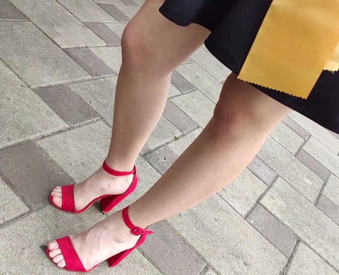 ? Legs of a hot slut in heels. Sexy feet candid