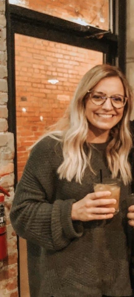 Hottie Macy happily does some topless jumping jacks backstage at the club