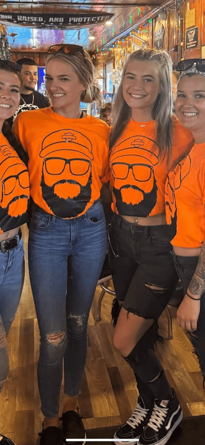 Hot Girls always go for the mean guys. Biker guy was making out with both of them as they strokedhim