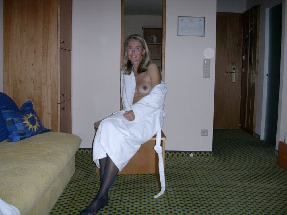 Gorgeous Blonde MILF poses in lingerie