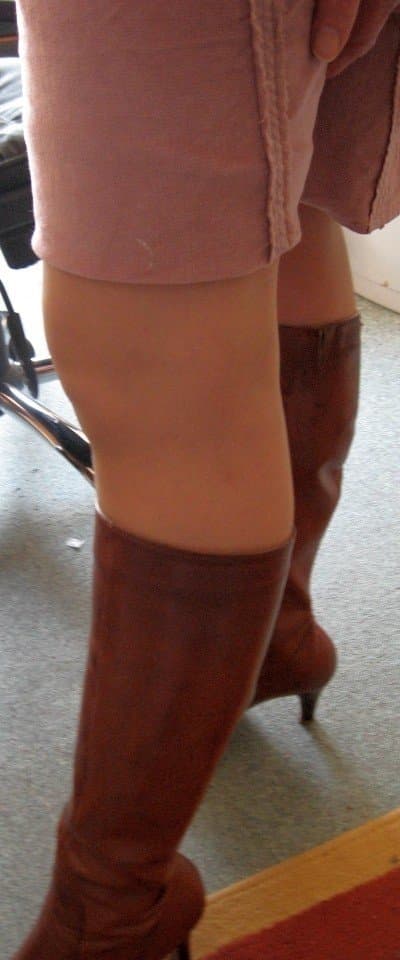 CFNM MILF Nadia with her decent skirt and boots on ,is going to show two young fans what cfnm means