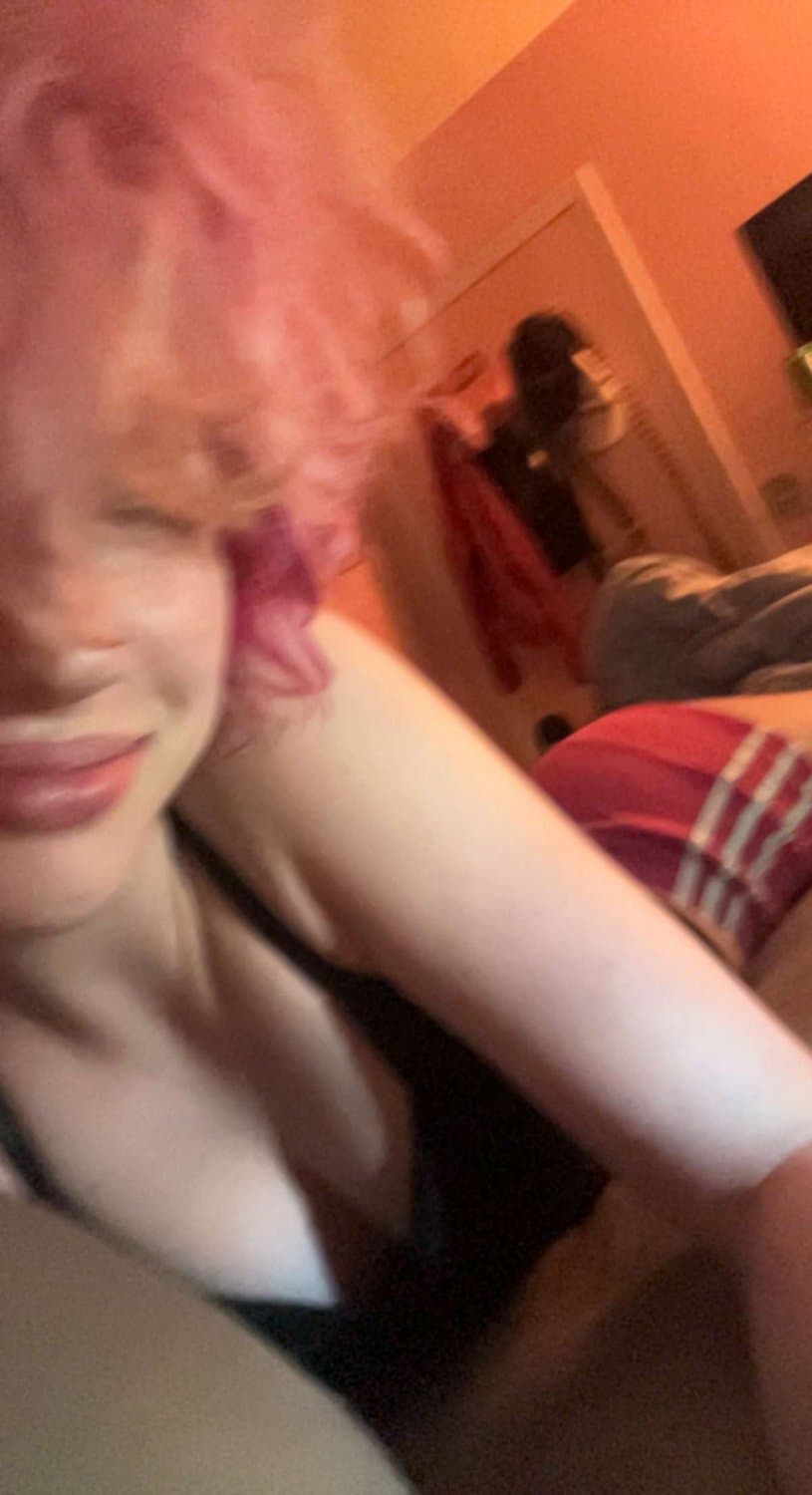 pink haired emo girl arches and shows ass
