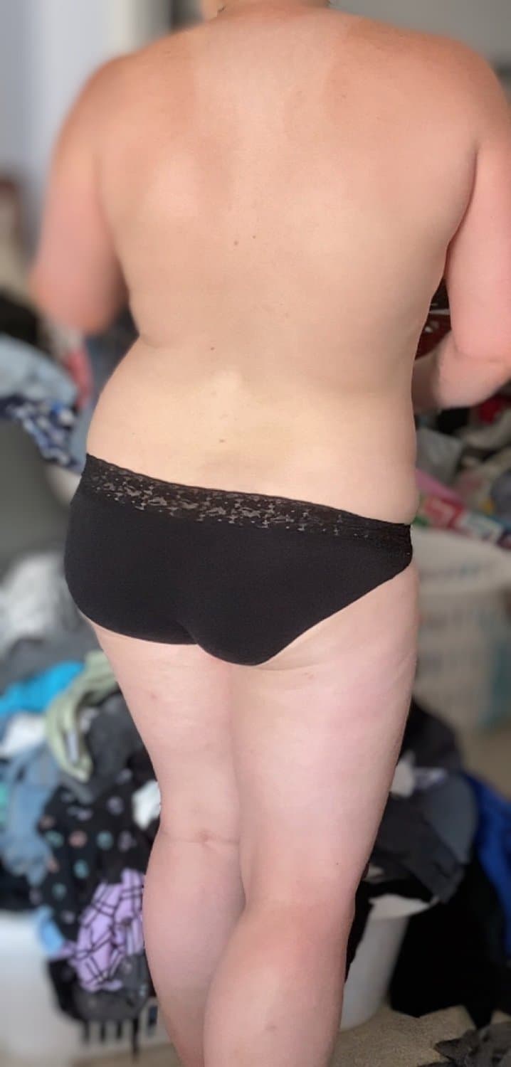 Wife getting dressed after her shower