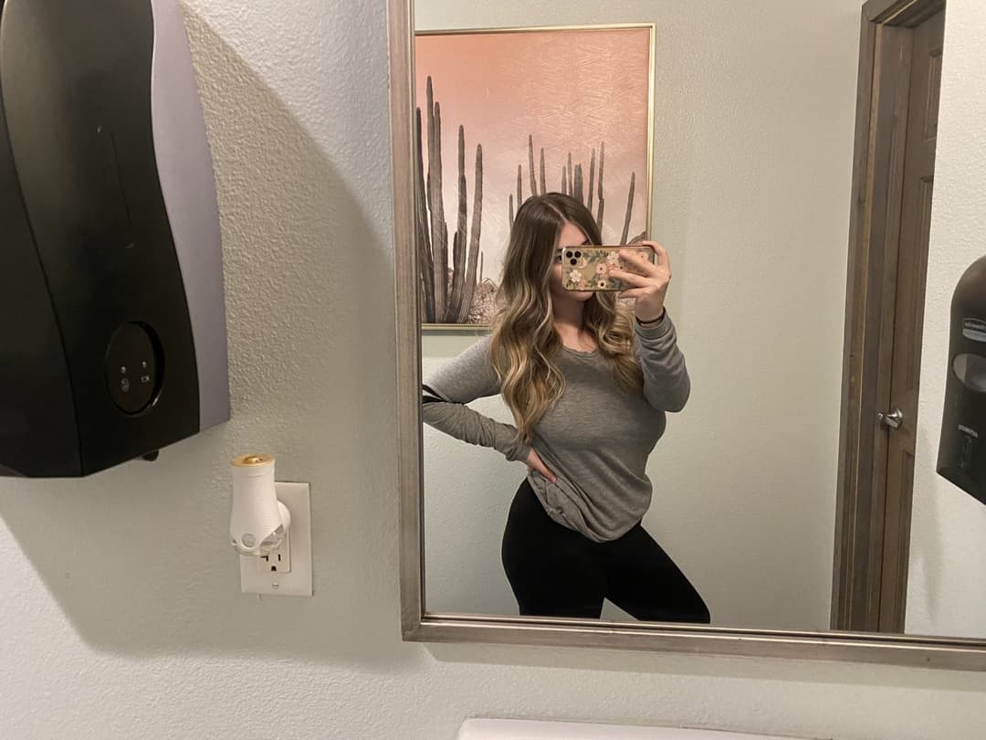 Click to view full size Hottest Milf ever? This curvy slut who loves sticking her tongue out comes damn close