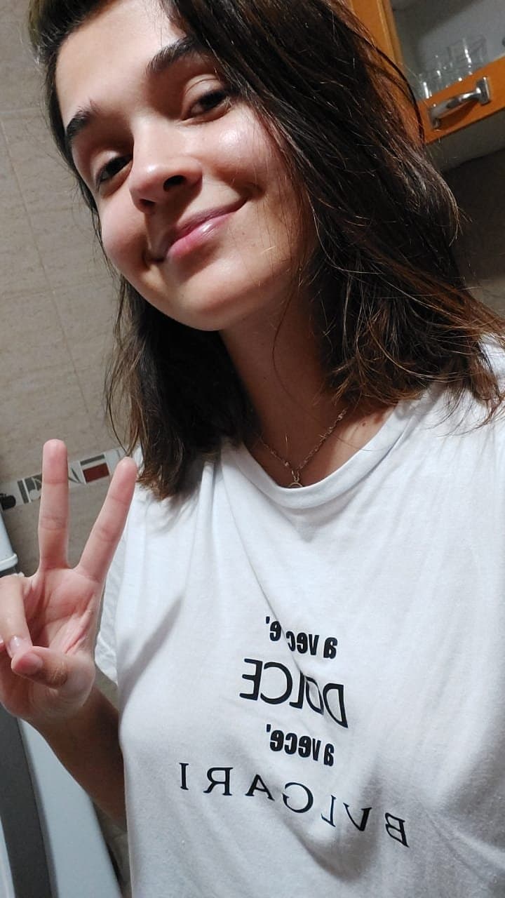 Brunette slut fake tits pretty smile