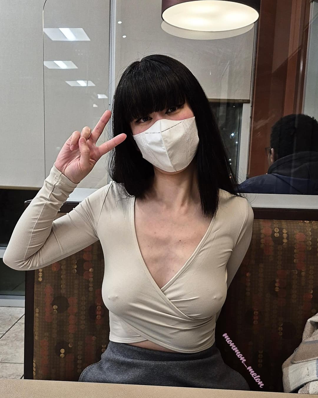 Pierced braless Asian ??