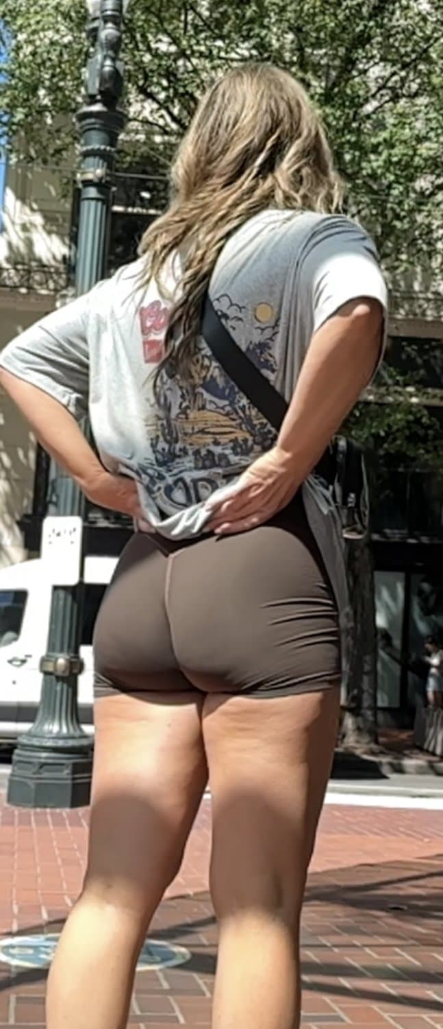 Click to view full size Candid booty in brown shorts
