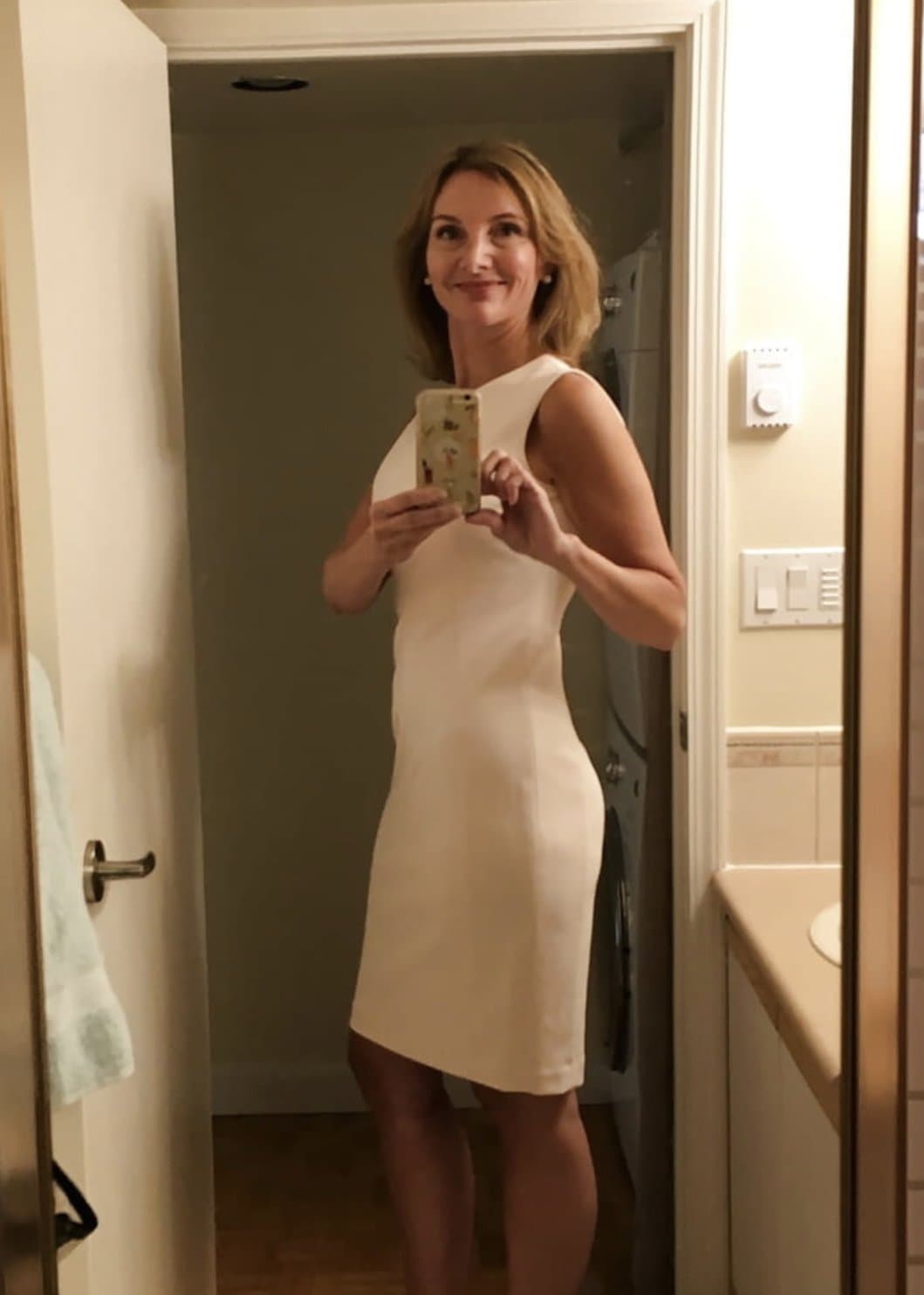 Click to view full size Elegant MILF shows her panties