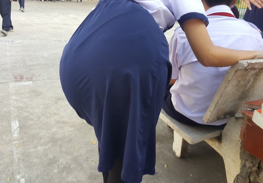 Asian teen has such a fat plump ass, and she is showing without a care