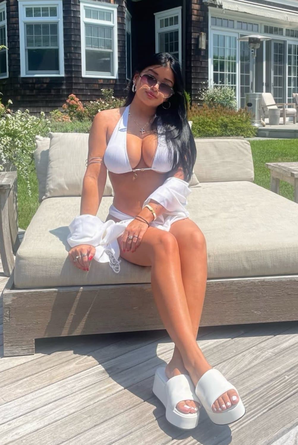 Big tittied Asian made sure she got her sexy feet in the pic. Busty whore