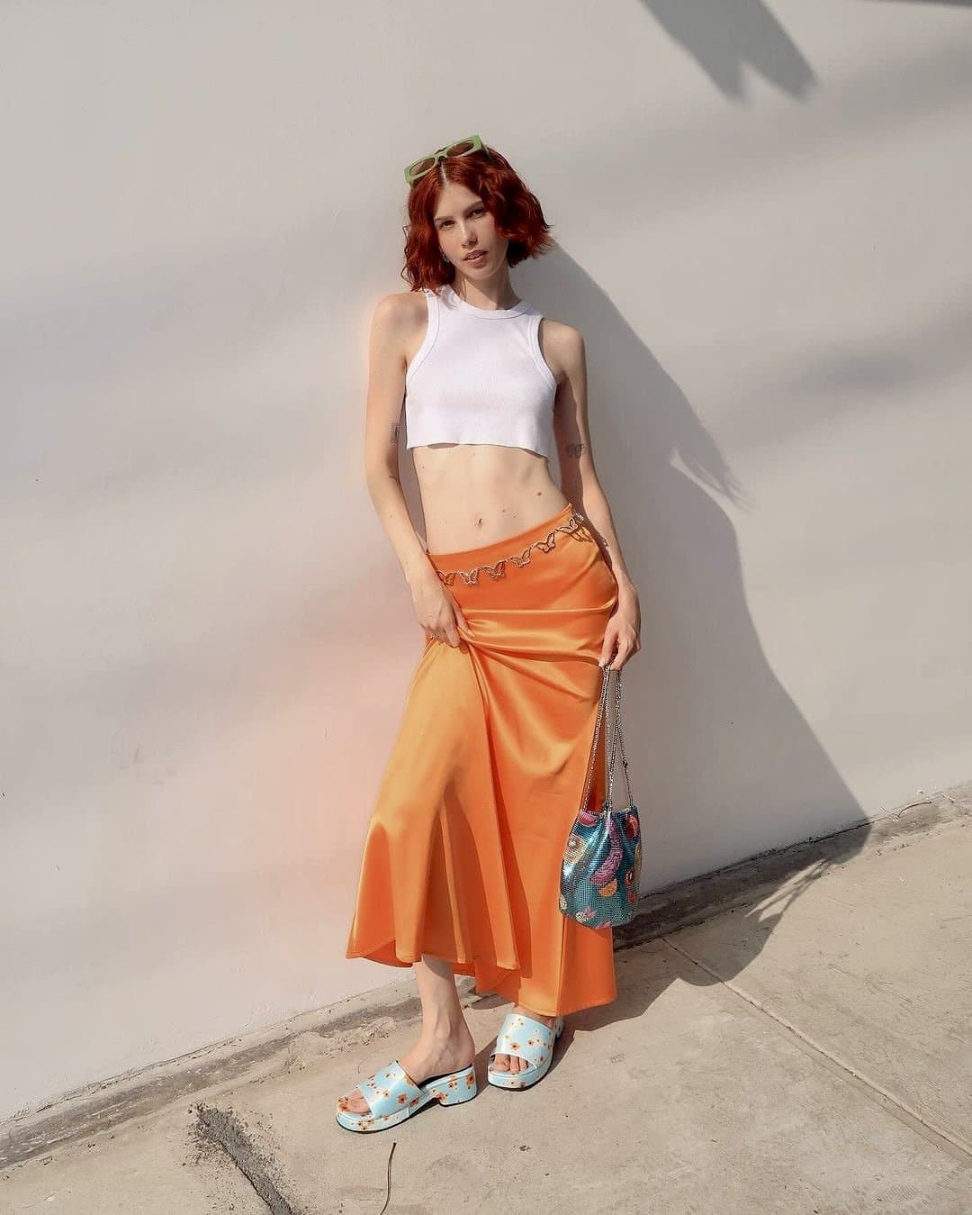 Ginger slut shows her small boobs