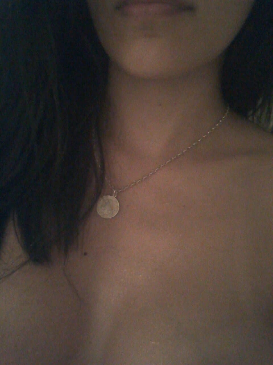 Brunette slut fake tits pretty smile