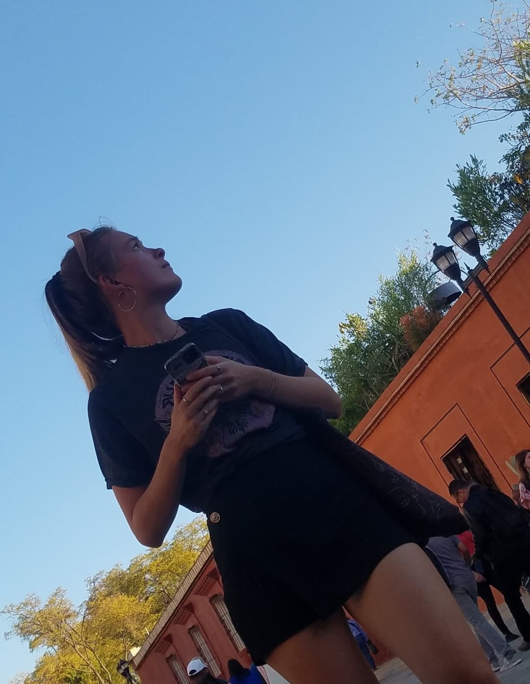 2 friends, blonde and brunette, in shorts, nice legs