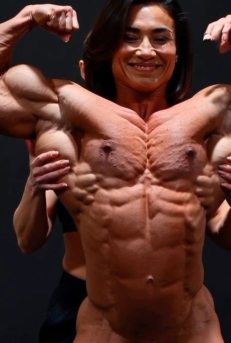 Click to view full size And a naked bodybuilder really loves her roided muscles to be worshipped by girls