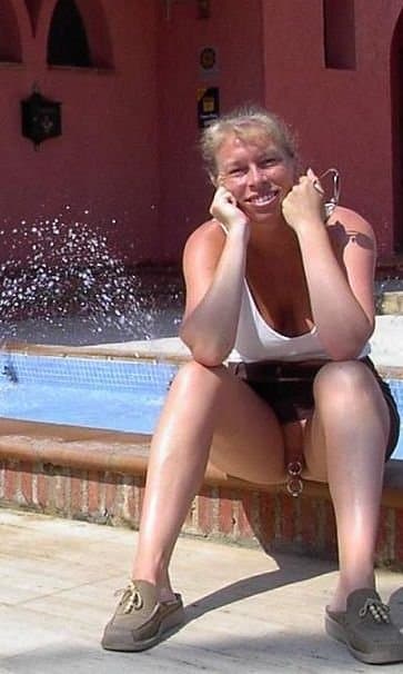 Amateur flasher with cunt piercings