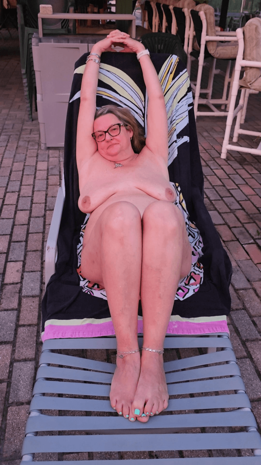 Beautiful mature old woman naked outdoors