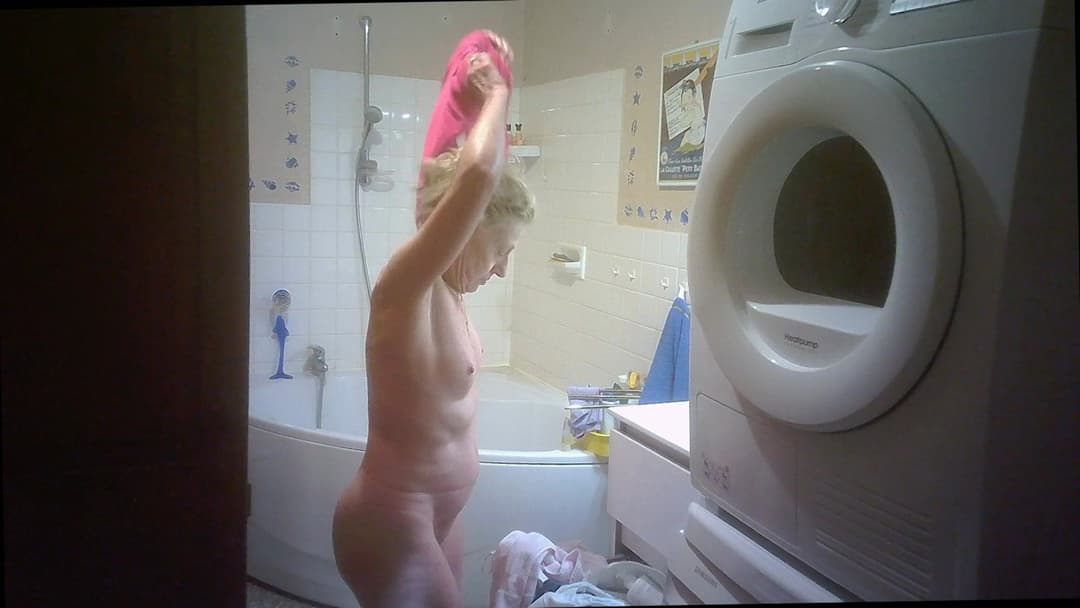 Two hidden cams for nurse Solange braless