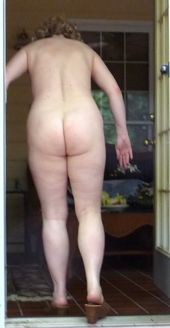 my wife posing naked outside