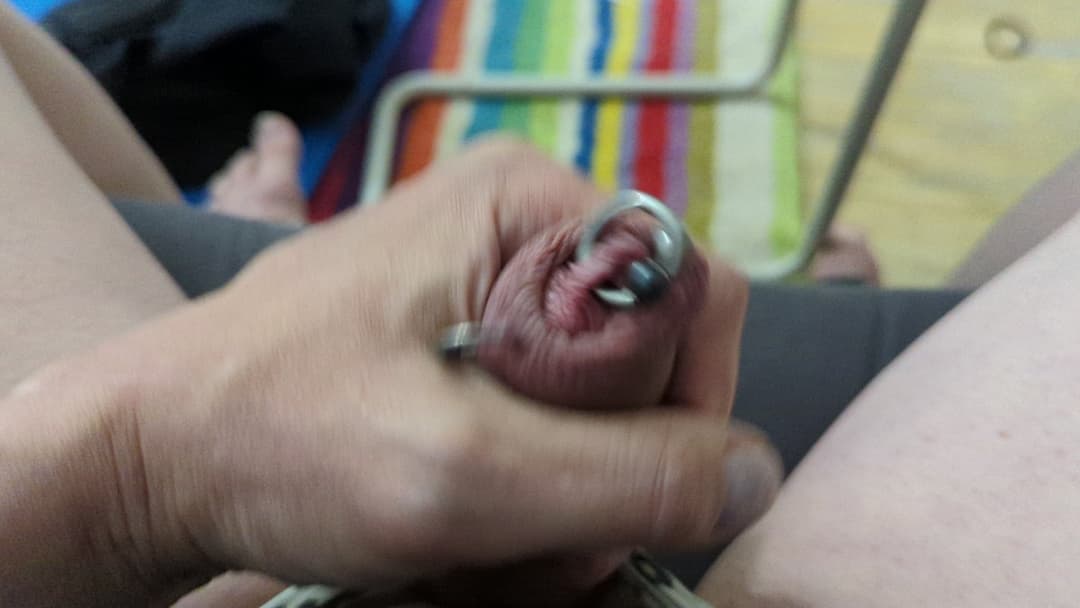 Chronic masturbating loser wanking pierced cock and cumming watching humiliation porn in panties