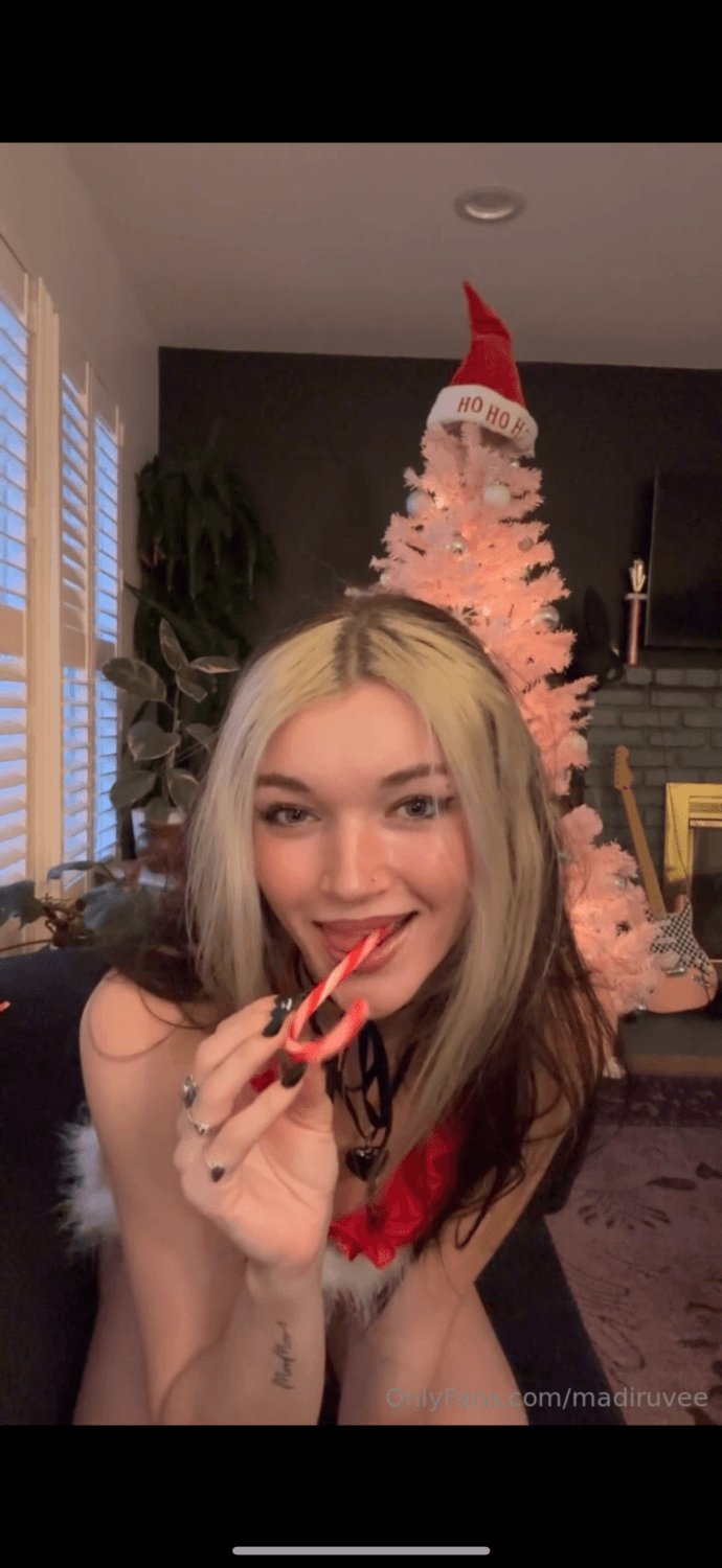 Hottie teases with candy then bates with candy cane dildo