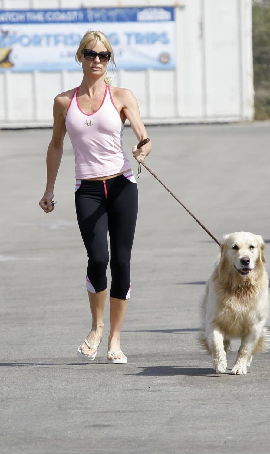 Nicollette Sheridan in platform flip flops