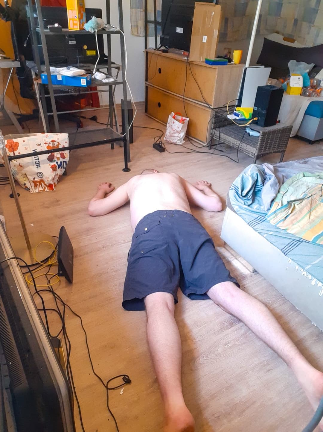 Naked male virgin beaten unconscious in front of people and filmed twitching