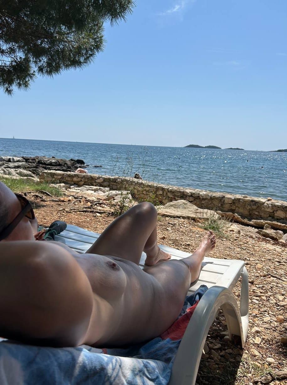 Nudist wife on beach showing again sexy tits & shaved pussy outdoor