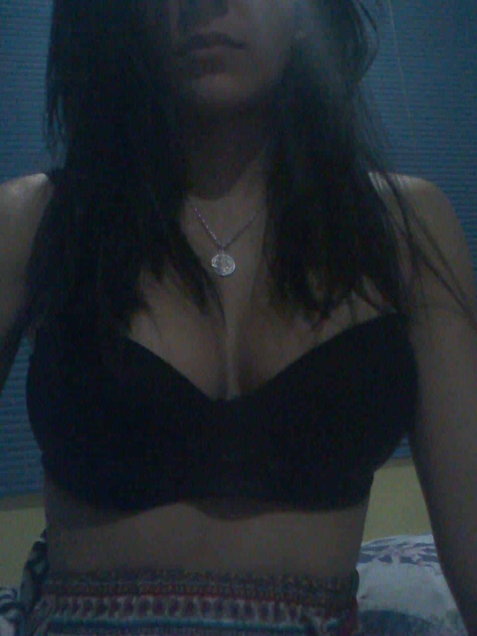 Brunette slut fake tits pretty smile