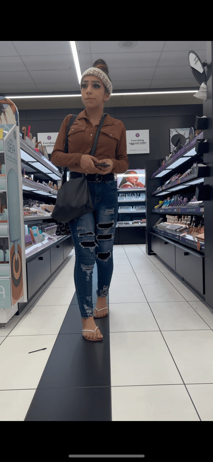 Candid busty shoplifting Latina with perfect feet and body